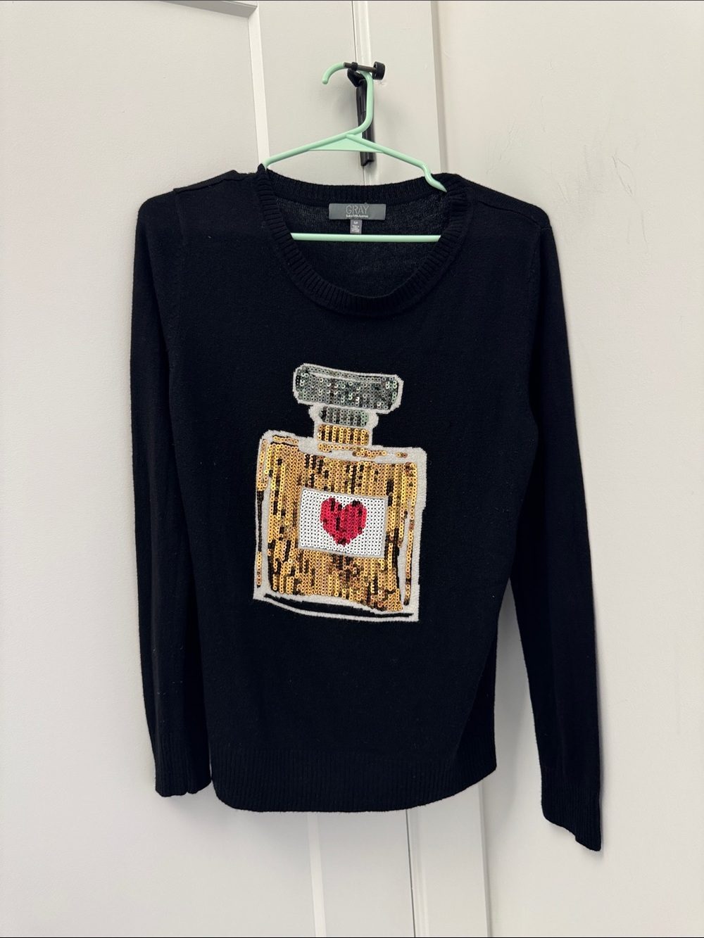 Saks Fifth Avenue Black Crewneck Sweater with Sequin Perfume Bottle Motif